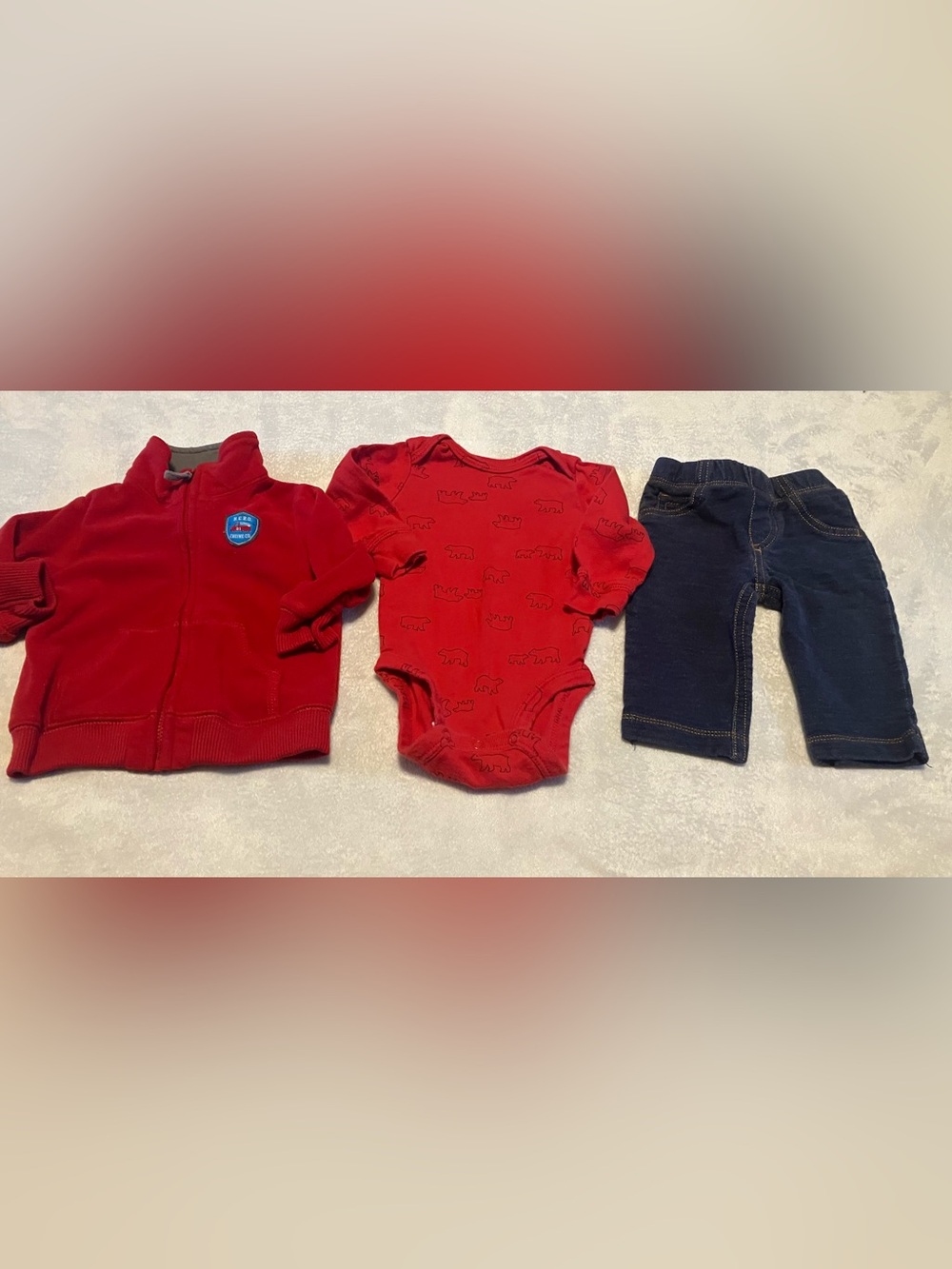 Red bear onesie, red sweatshirt and blue pants